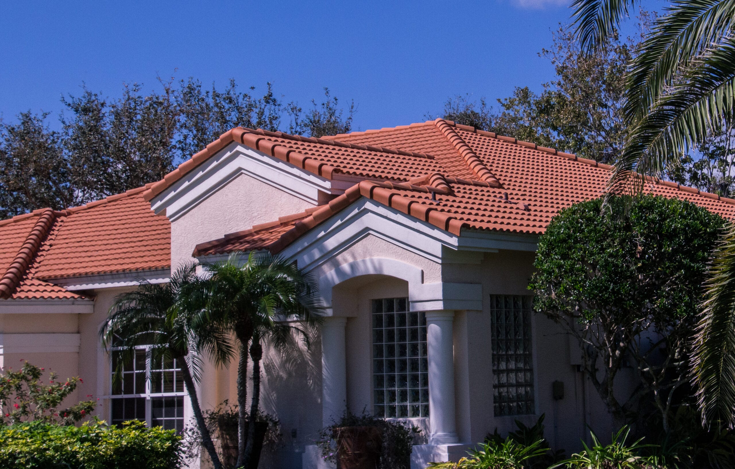 Stucco home with tile roof