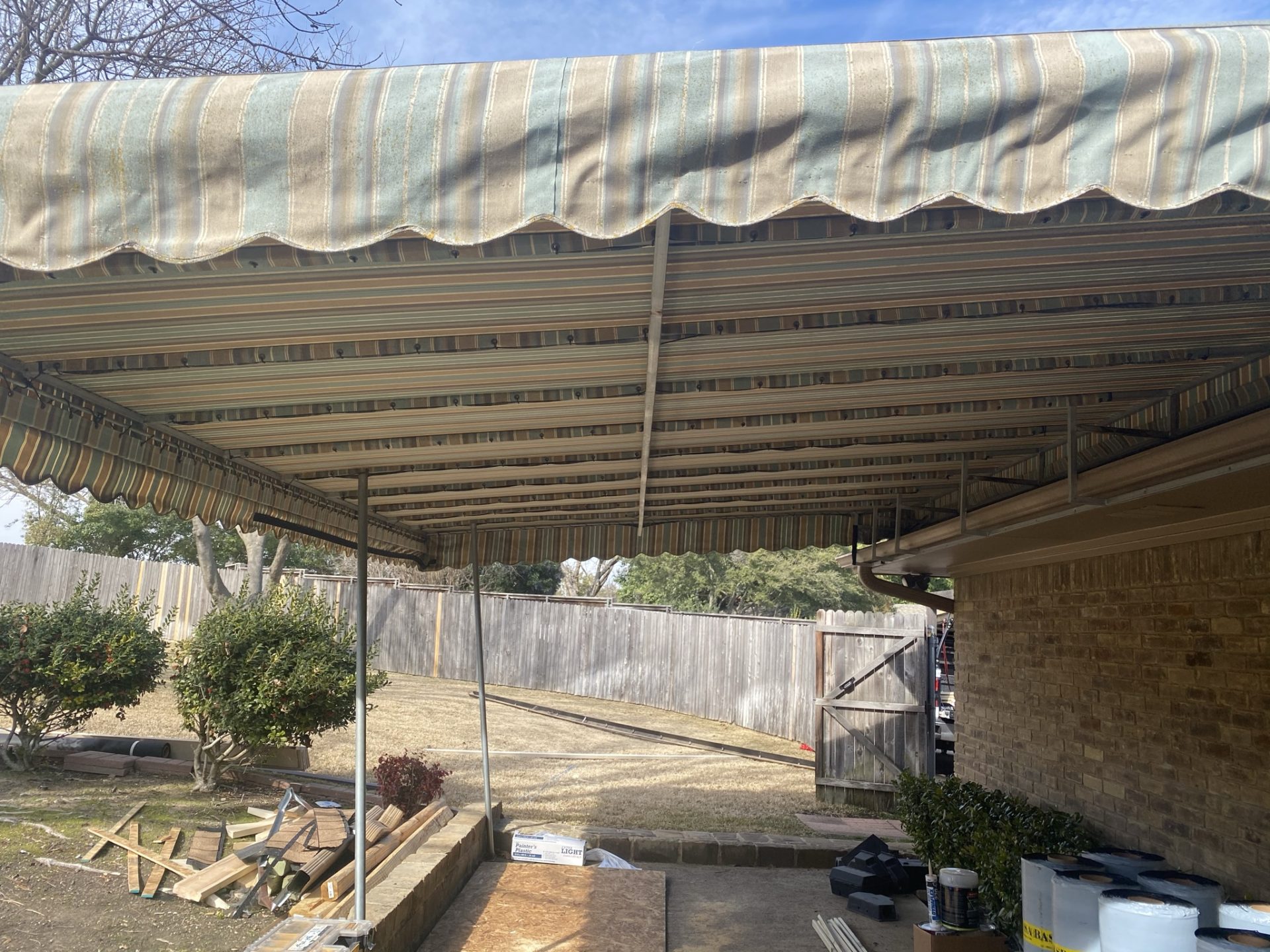 Before picture of old patio in Dallas, TX before Jenkins Roofing patio rebuild.