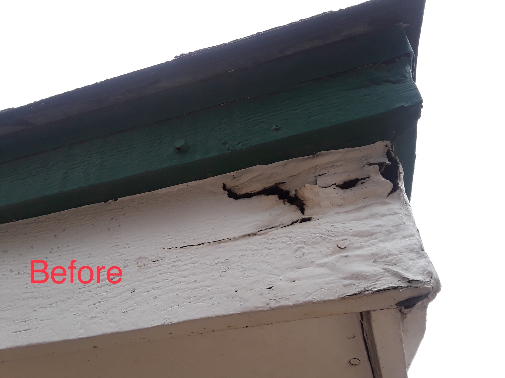 Fascia damage on edge of home under roof needing repair