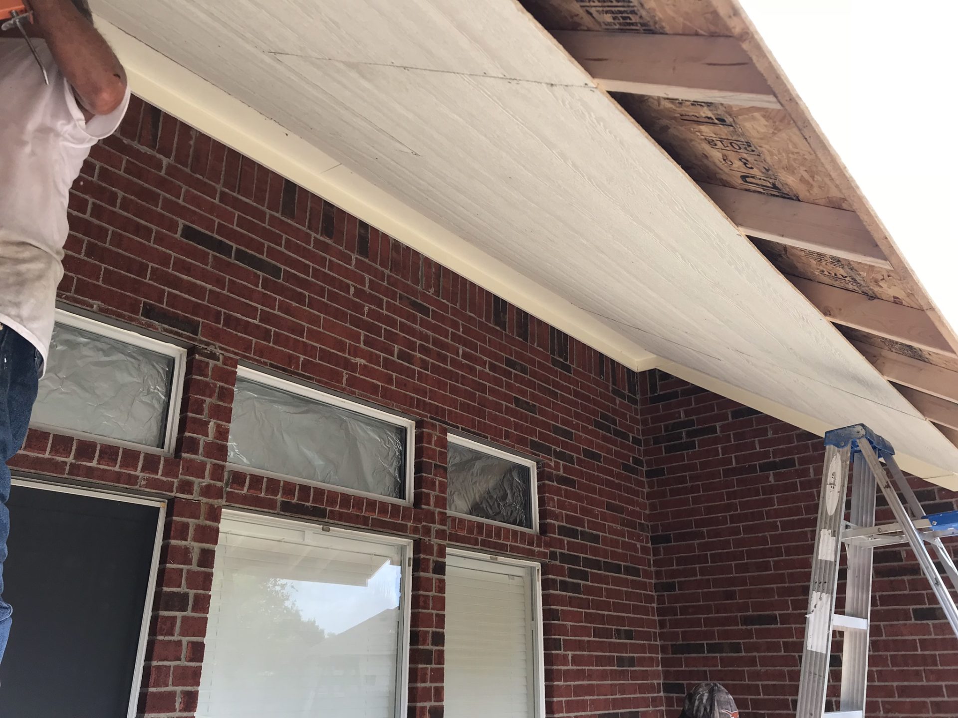Underside of slanted patio roof by Jenkins Roofing for a homeowner in the Dallas Fort Worth metroplex.
